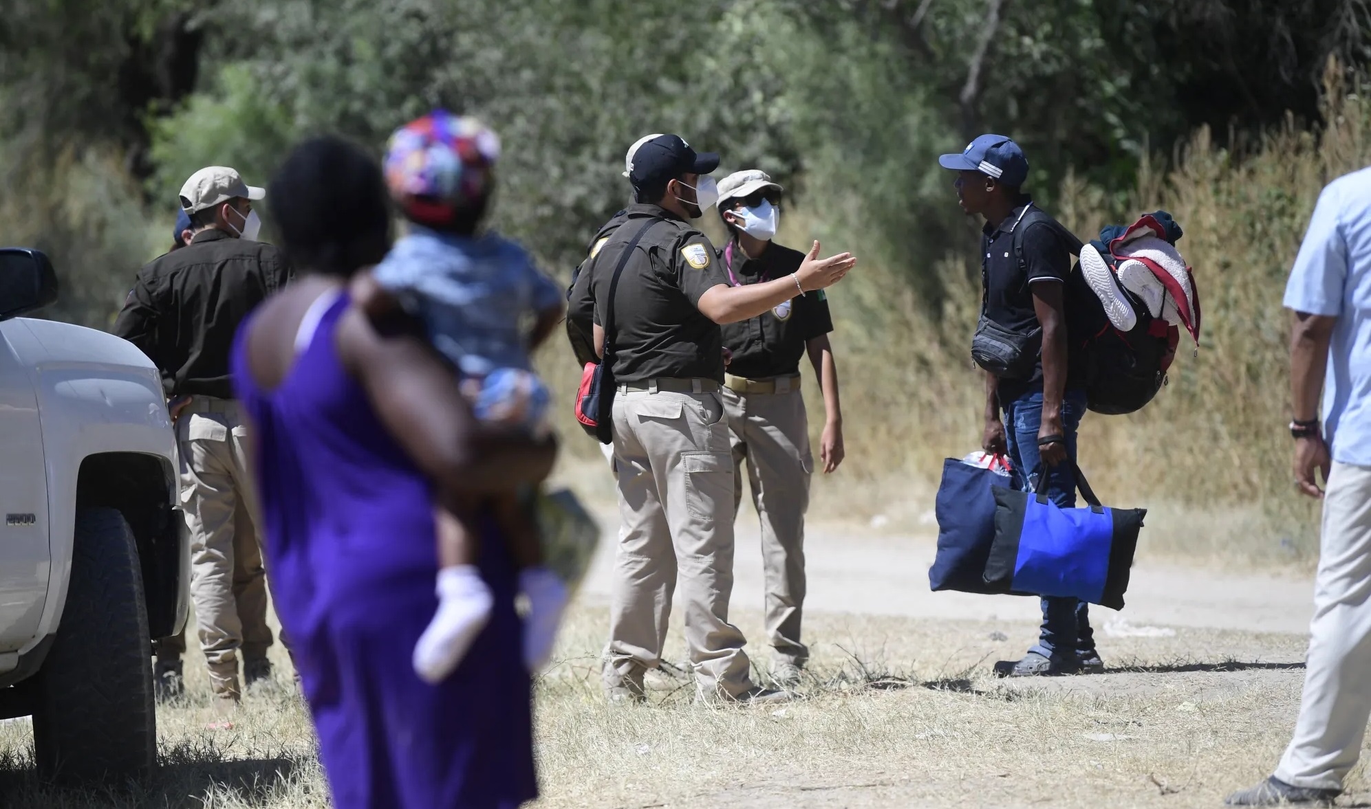 They rescue 129 migrants who were abandoned inside two trucks in northern Mexico