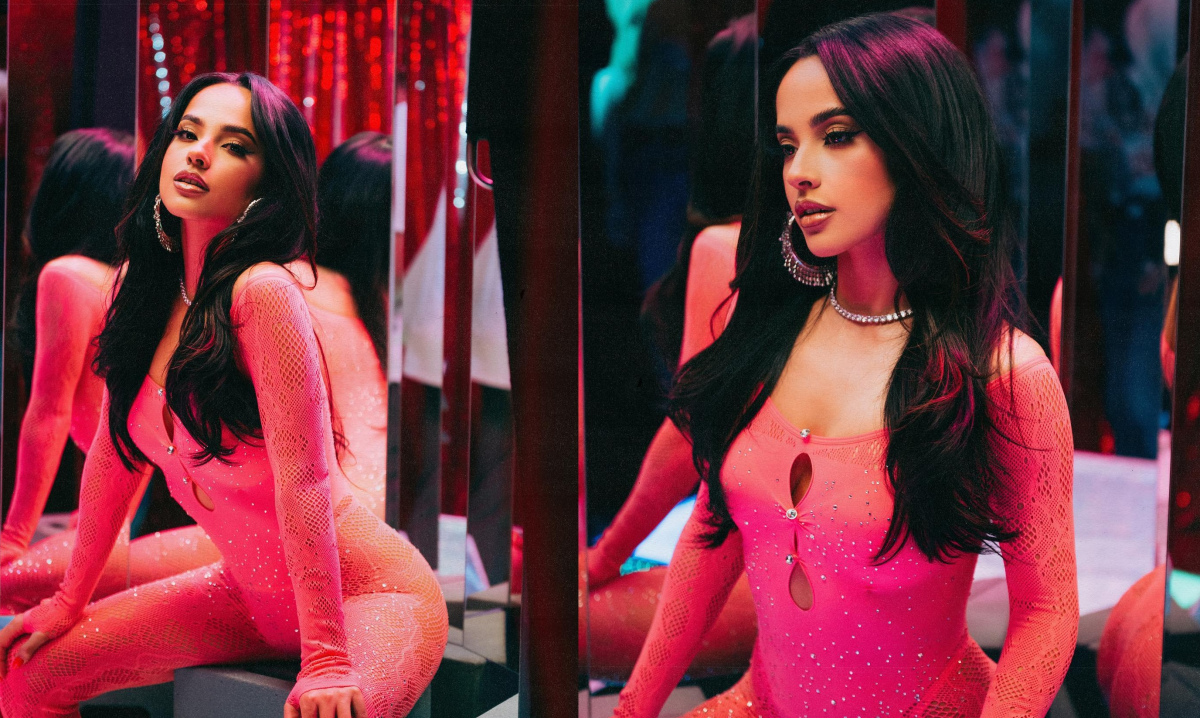 Becky G poses in a string micro bikini showing off her perfect tan