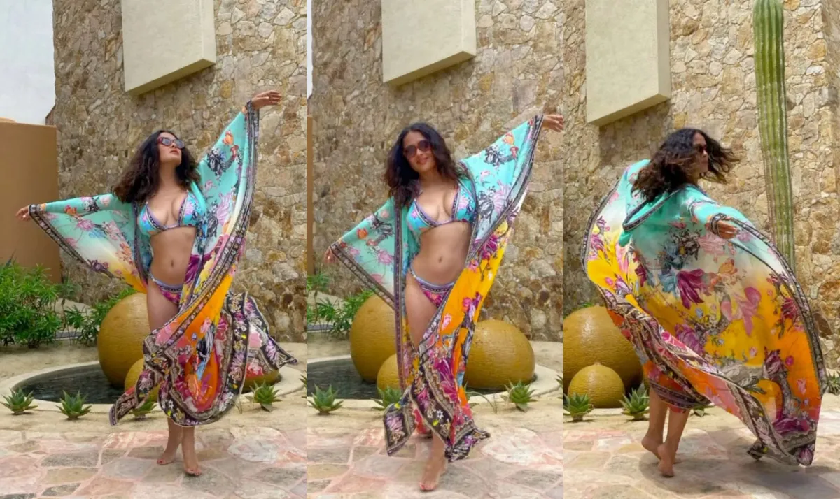 Salma Hayek twirls in eye popping bikini at 57