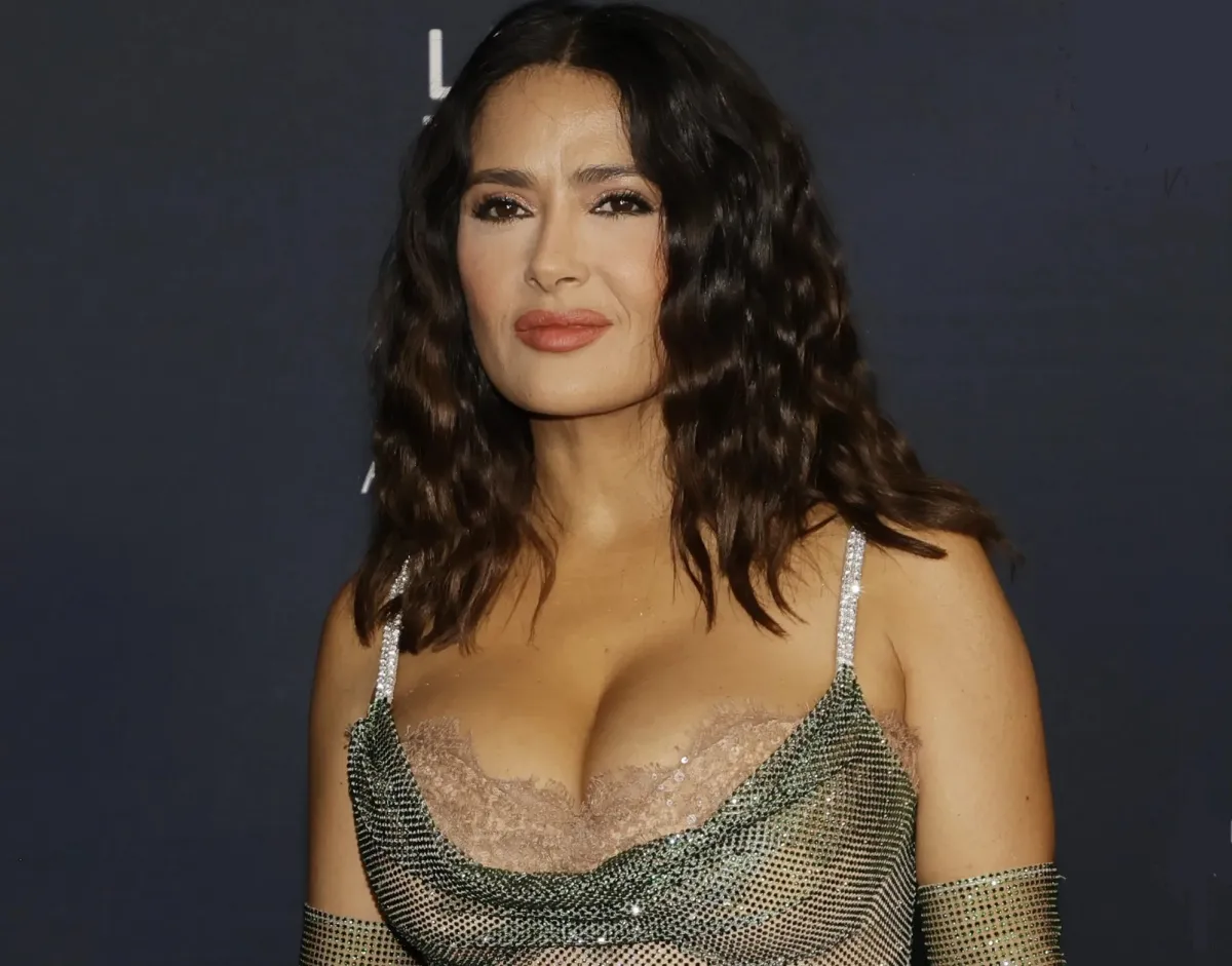 Salma Hayek is presumed to be eating a very special strawberry shaped dessert