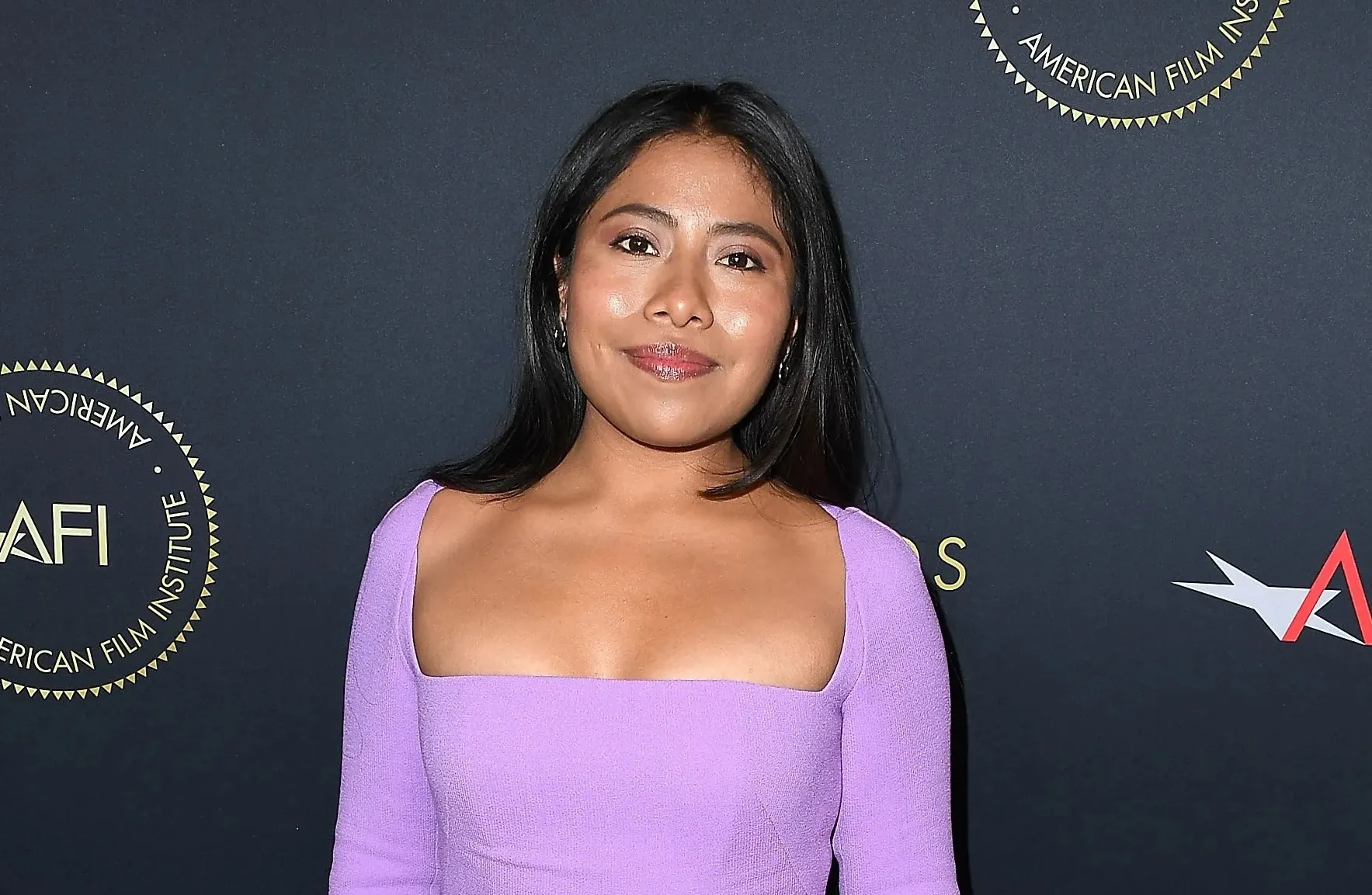 Yalitza Aparicio poses in leggings in front of the sea in Uruguay