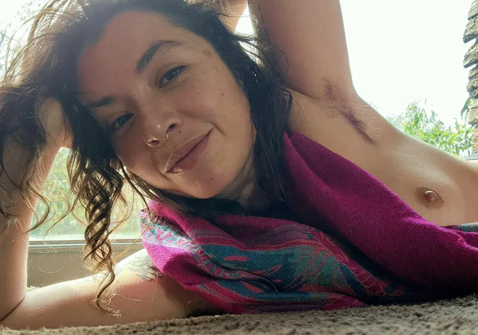 Aria Loca boldly challenges societal norms by embracing her natural body hair