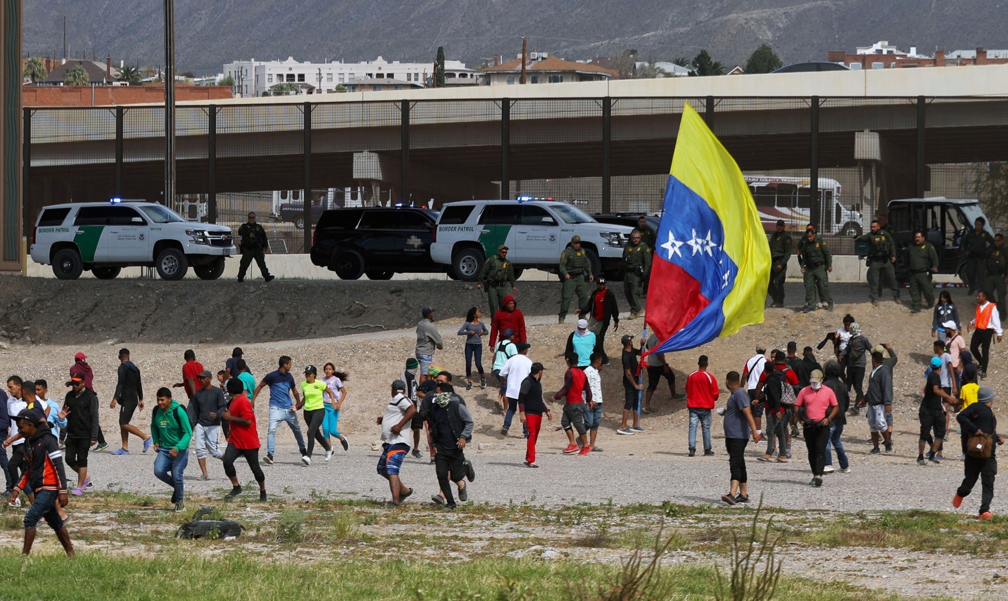 The crowd of migrants who tried to force their way across the US border in El Paso