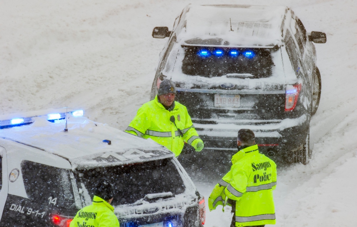 Snowstorm covers Northern California while to the south the rains cause street closures due to flooding