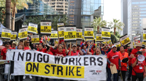 Hotel workers march in Los Angeles determined to hold out strike