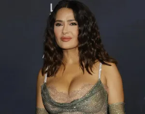 Salma Hayek is presumed to be eating a very special strawberry-shaped dessert