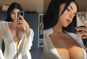 Demi Rose Stuns in Plunging White Dress, Flaunting Killer Curves with no Bra