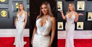 Chiquis Rivera glowing in a tight white dress with a deep neckline on the red carpet at the Grammys